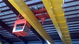 Flying Crane cab of 50 Ton double girder, top running crane where Cab moves with trolley
