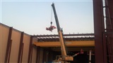 Installation of 33 Ton, 90' span, double girder, top running, remote controlled bridge crane